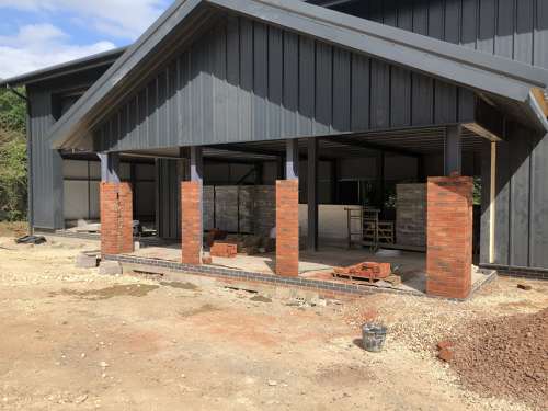 Showroom entrance pillars to start to go up