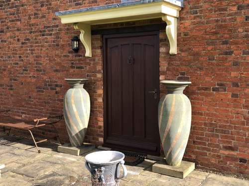 Pair of Philip Simmonds pots -