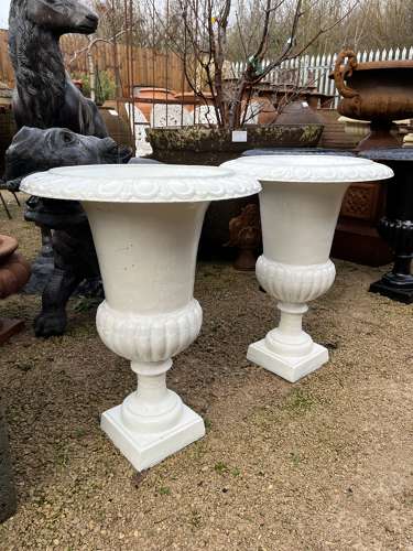 Pair of Rusty white cast iron campagna urns - cast iron planters