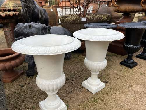 Pair of Rusty white cast iron campagna urns - cast iron planters