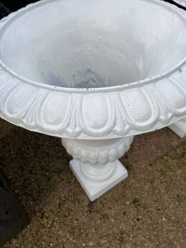 Pair of Rusty white cast iron campagna urns - cast iron planters