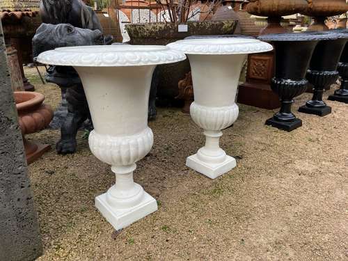 Pair of Rusty white cast iron campagna urns - cast iron planters