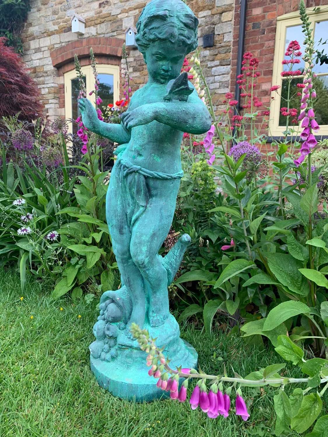Girl Statue with Butterfly