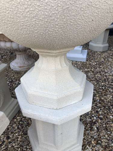 Pair of Hexagonal Stone Urns and Plinths