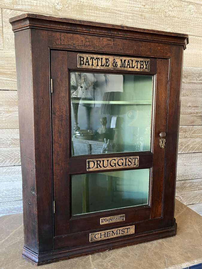 Battle and Maltby Druggist Corner Cabinet