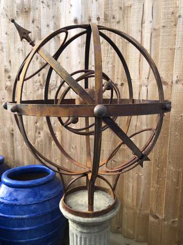 Armillary on stone column