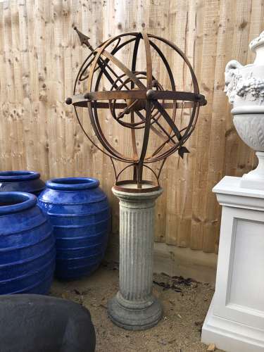 Armillary on stone column