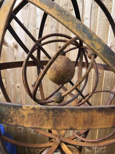 Armillary on stone column