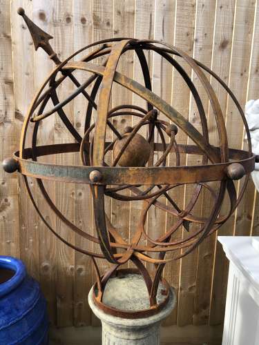 Armillary on stone column