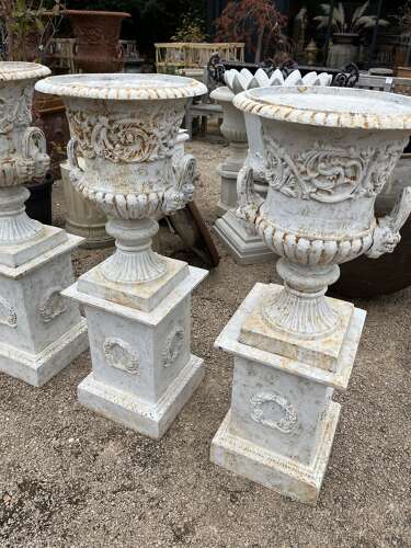 Pair of Cast iron Campagna Urns & Plinths
