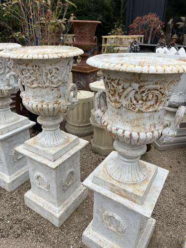 Pair of Cast iron Campagna Urns & Plinths