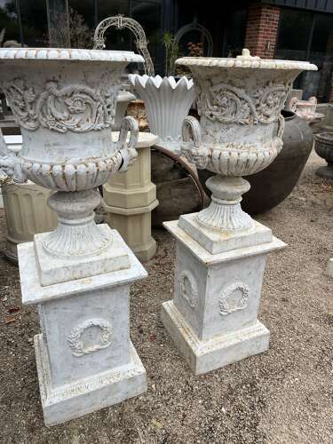 Pair of Cast iron Campagna Urns & Plinths