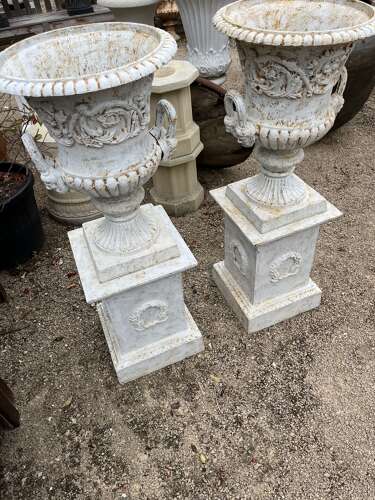 Pair of Cast iron Campagna Urns & Plinths