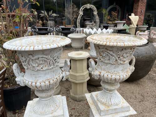 Pair of Cast iron Campagna Urns & Plinths