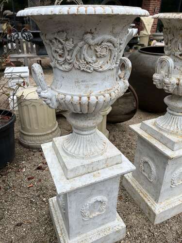Pair of Cast iron Campagna Urns & Plinths
