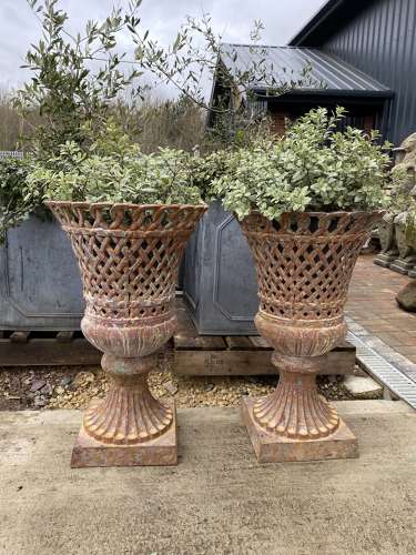 Pair of Lattice Cast Iron Urns
