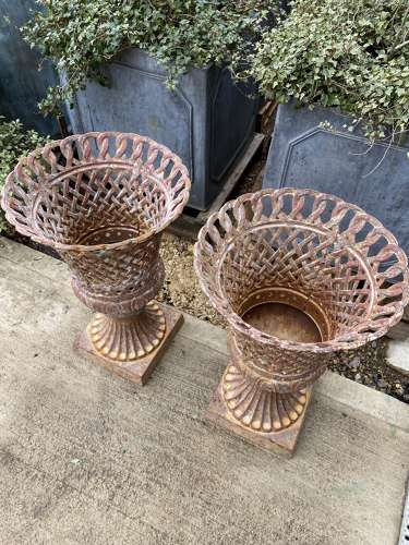 Pair of Lattice Cast Iron Urns