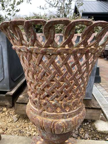 Pair of Lattice Cast Iron Urns