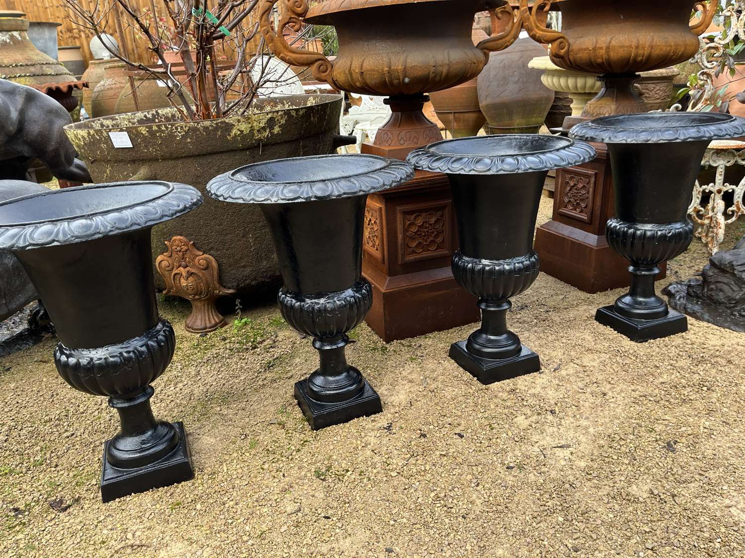 Set of four black Cast Iron Campagna urns 63 cm x 47