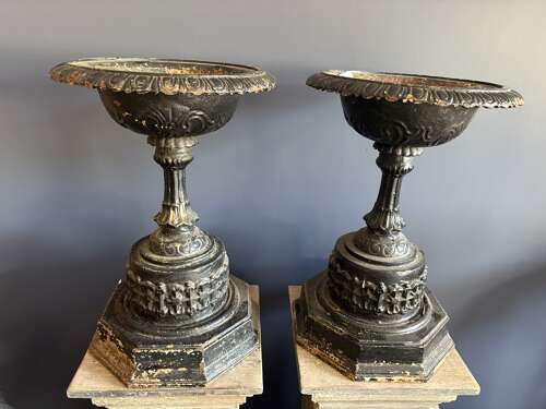 Antique pair of black cast iron urns