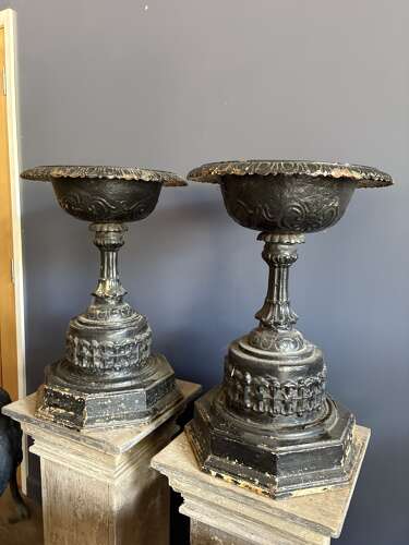 Antique pair of black cast iron urns
