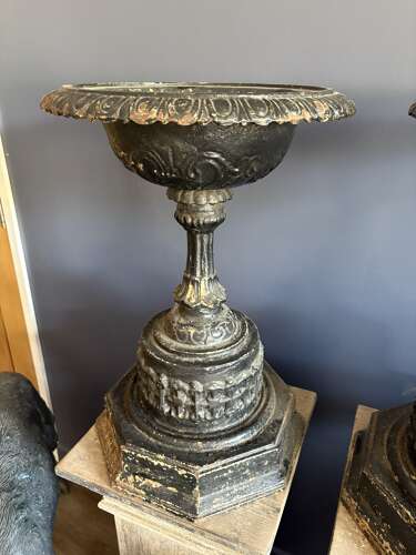 Antique pair of black cast iron urns