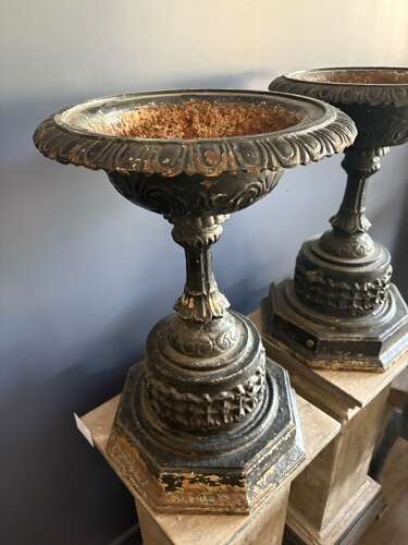 Antique pair of black cast iron urns