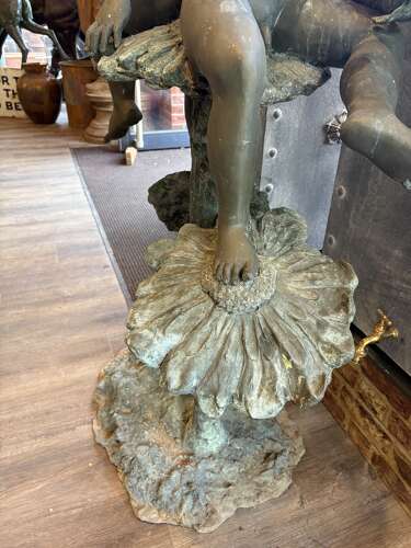 Bronze water feature of 2 boys