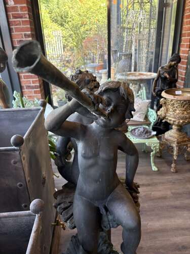 Bronze water feature of 2 boys