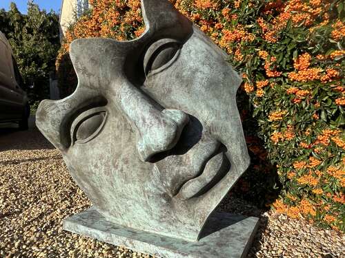 Bronze abstract face - garden sculpture