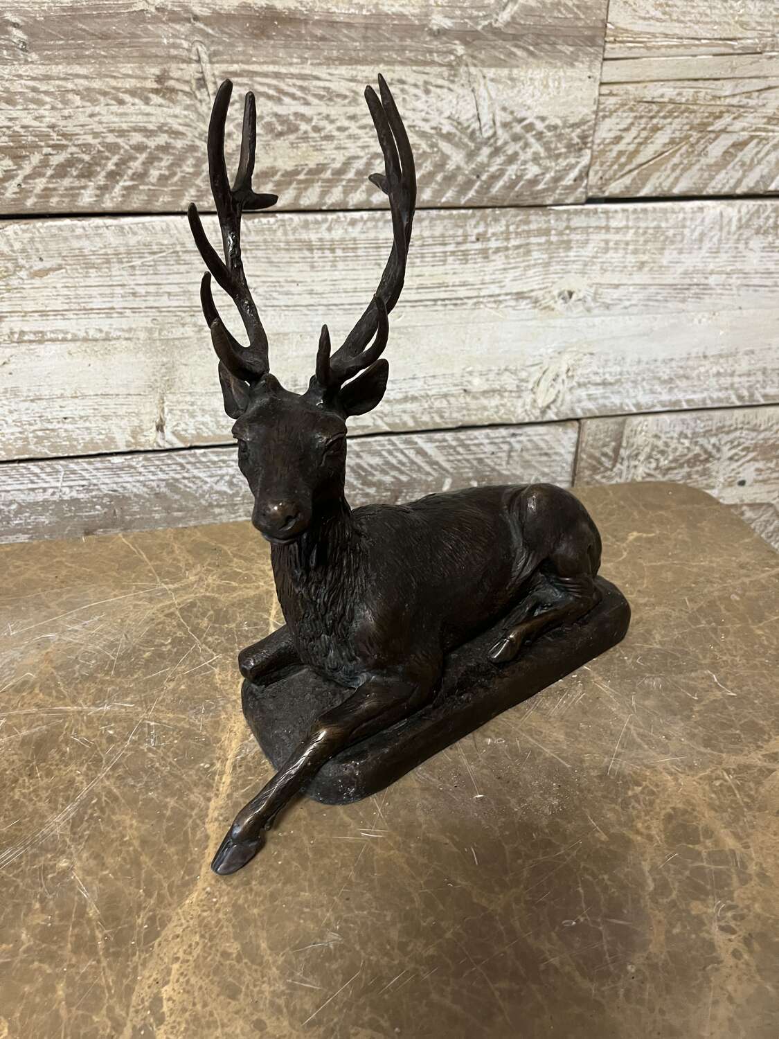 Bronze stag sculpture - laying bronze bronze stag