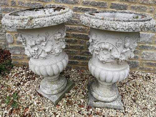 Pair of Haddonstone Florentine urns
