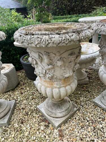 Pair of Haddonstone Florentine urns