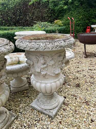Pair of Haddonstone Florentine urns