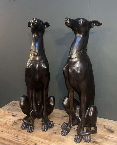 Pair of bronze sitting Whippets - bronze dogs