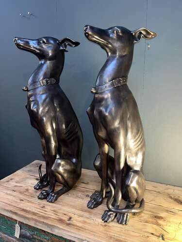 Pair of bronze sitting Whippets - bronze dogs