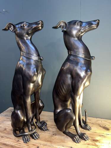 Pair of bronze sitting Whippets - bronze dogs