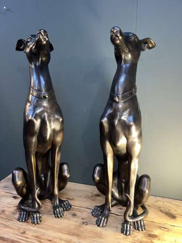 Pair of bronze sitting Whippets - bronze dogs