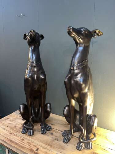 Pair of bronze sitting Whippets - bronze dogs