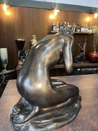 Bronze sculpture of a female with water jug - bronze water feature