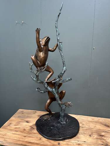 Bronze frogs on branch - bronze frog water feature