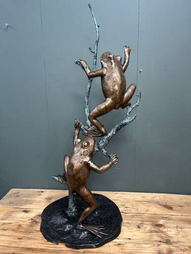 Bronze frogs on branch - bronze frog water feature
