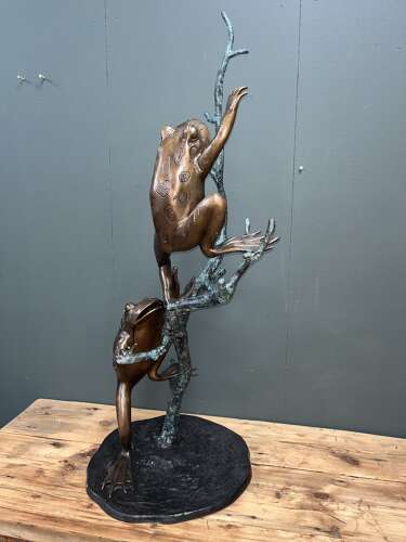 Bronze frogs on branch - bronze frog water feature