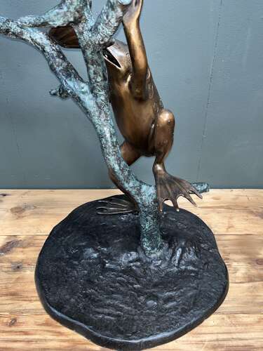 Bronze frogs on branch - bronze frog water feature