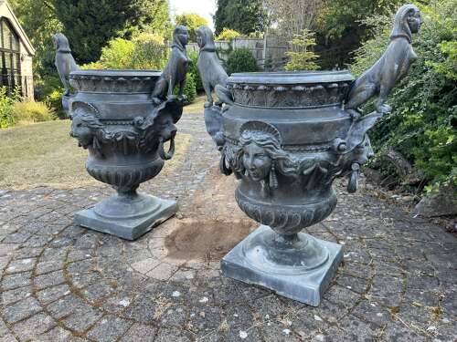 A set of FOUR bronze Versailles vases