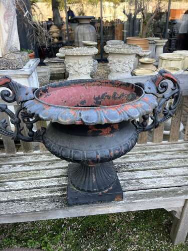 Pair of antique cast iron urns with handles