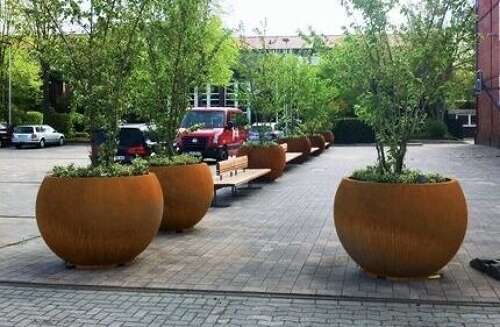 Large Corten steel globe planter - rusty round planters